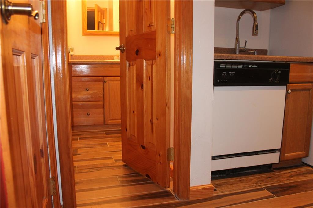 7204 Ryan Gulch Road, Unit 7204 Silverthorne, CO 80498 - Photo 5 of 17 a view of closet with wooden floor