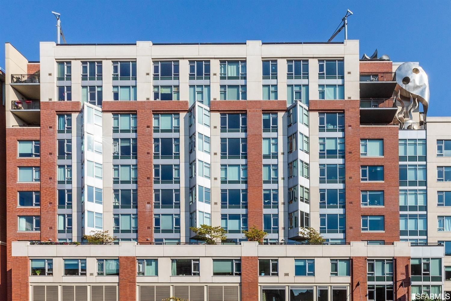 a front view of a building with a lot of windows