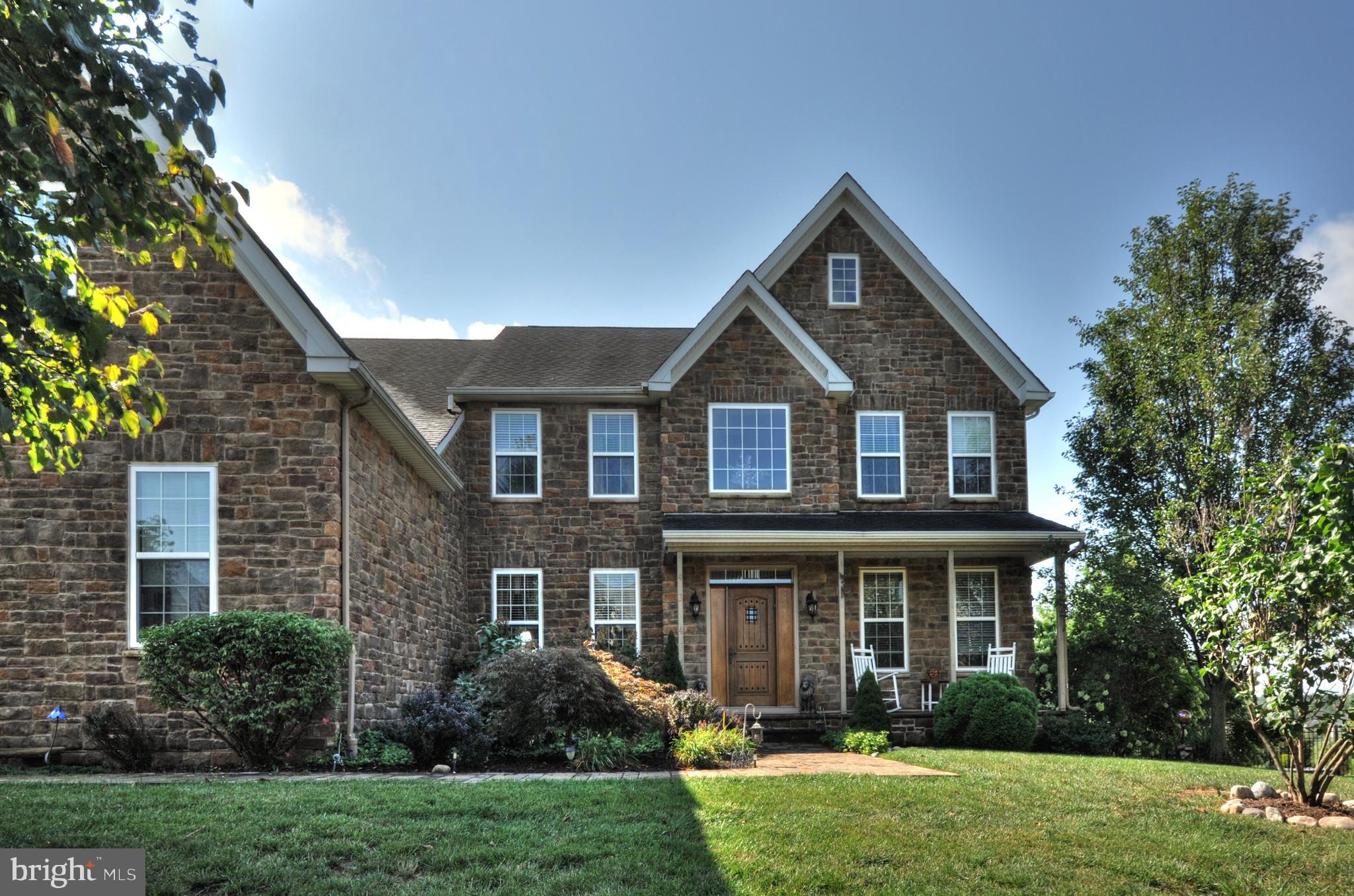 434 Hoffman Road Harleysville, PA 19438 - Photo 1 of 46 a front view of a house with garden