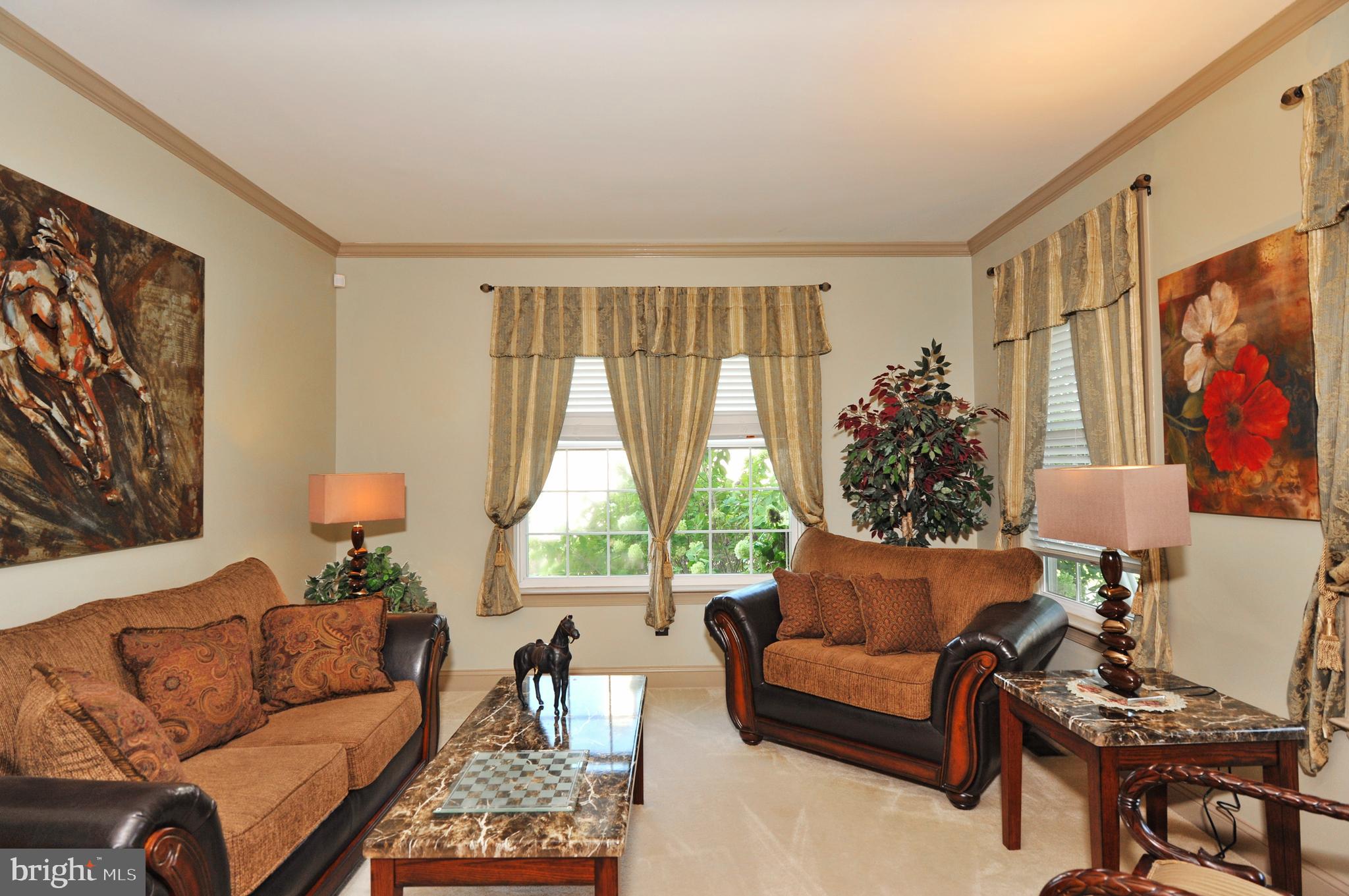 434 Hoffman Road Harleysville, PA 19438 - Photo 13 of 46 a living room with furniture and a large window