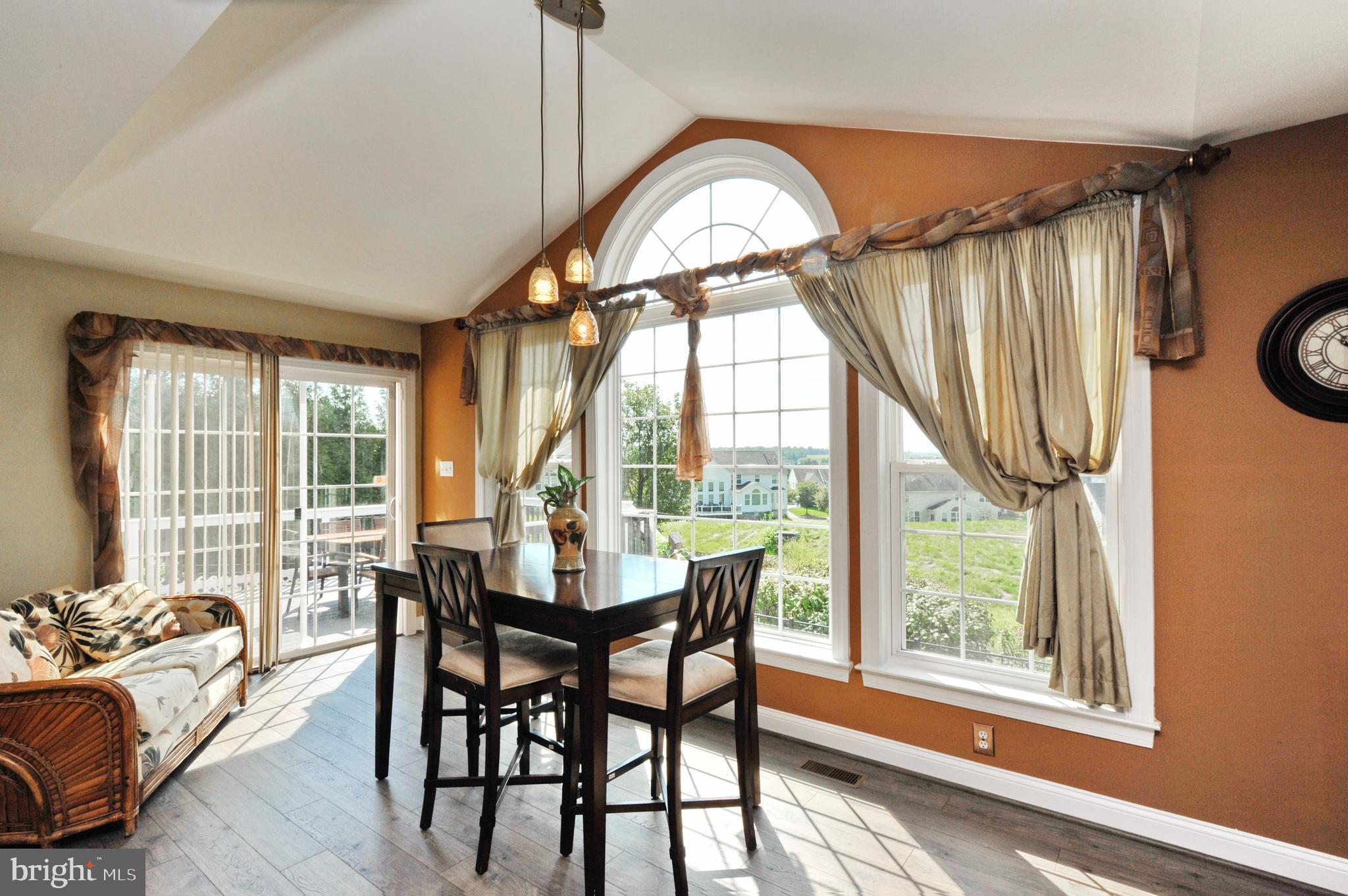 434 Hoffman Road Harleysville, PA 19438 - Photo 24 of 46 a dining room with furniture a chandelier and wooden floor