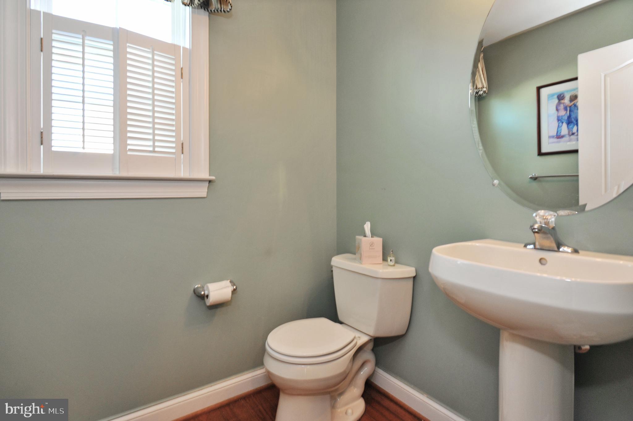 434 Hoffman Road Harleysville, PA 19438 - Photo 25 of 46 a bathroom with a toilet sink and mirror