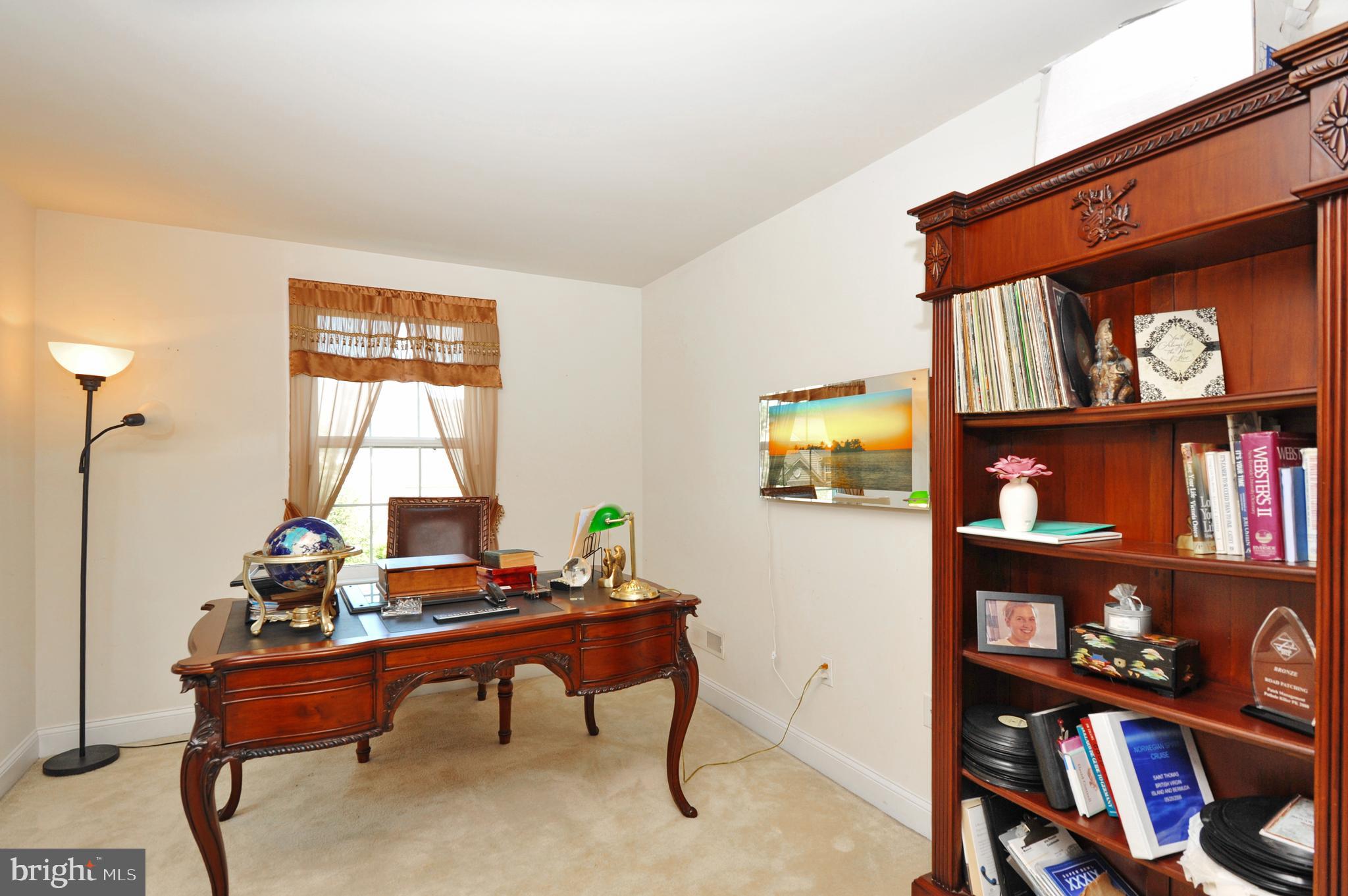 434 Hoffman Road Harleysville, PA 19438 - Photo 30 of 46 a room with bookshelf table and a window