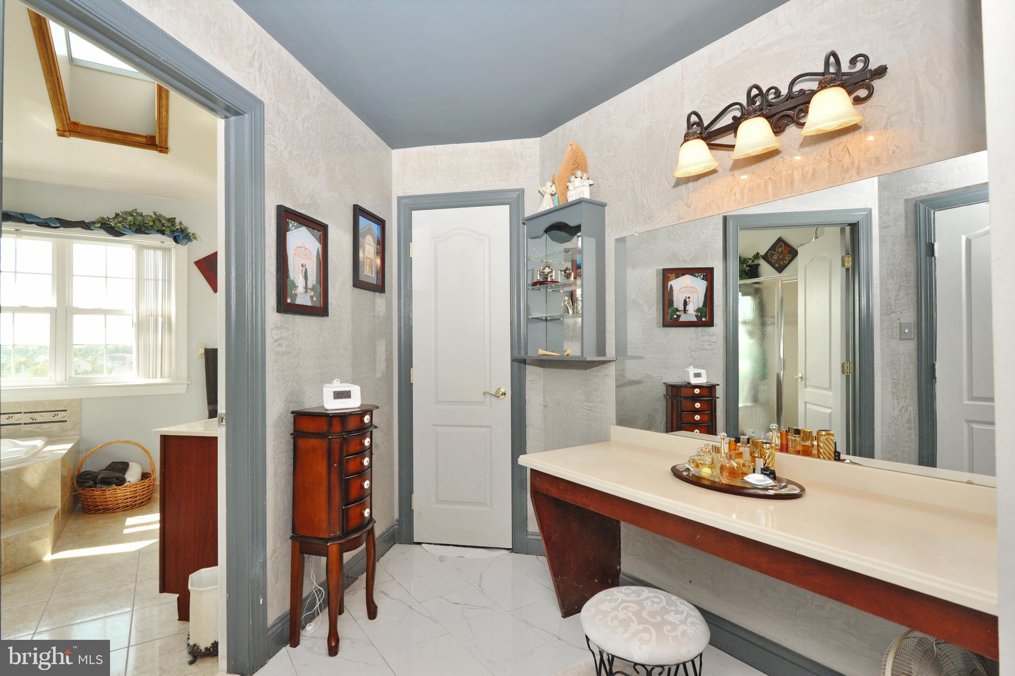 434 Hoffman Road Harleysville, PA 19438 - Photo 31 of 46 a bathroom with a sink and a mirror