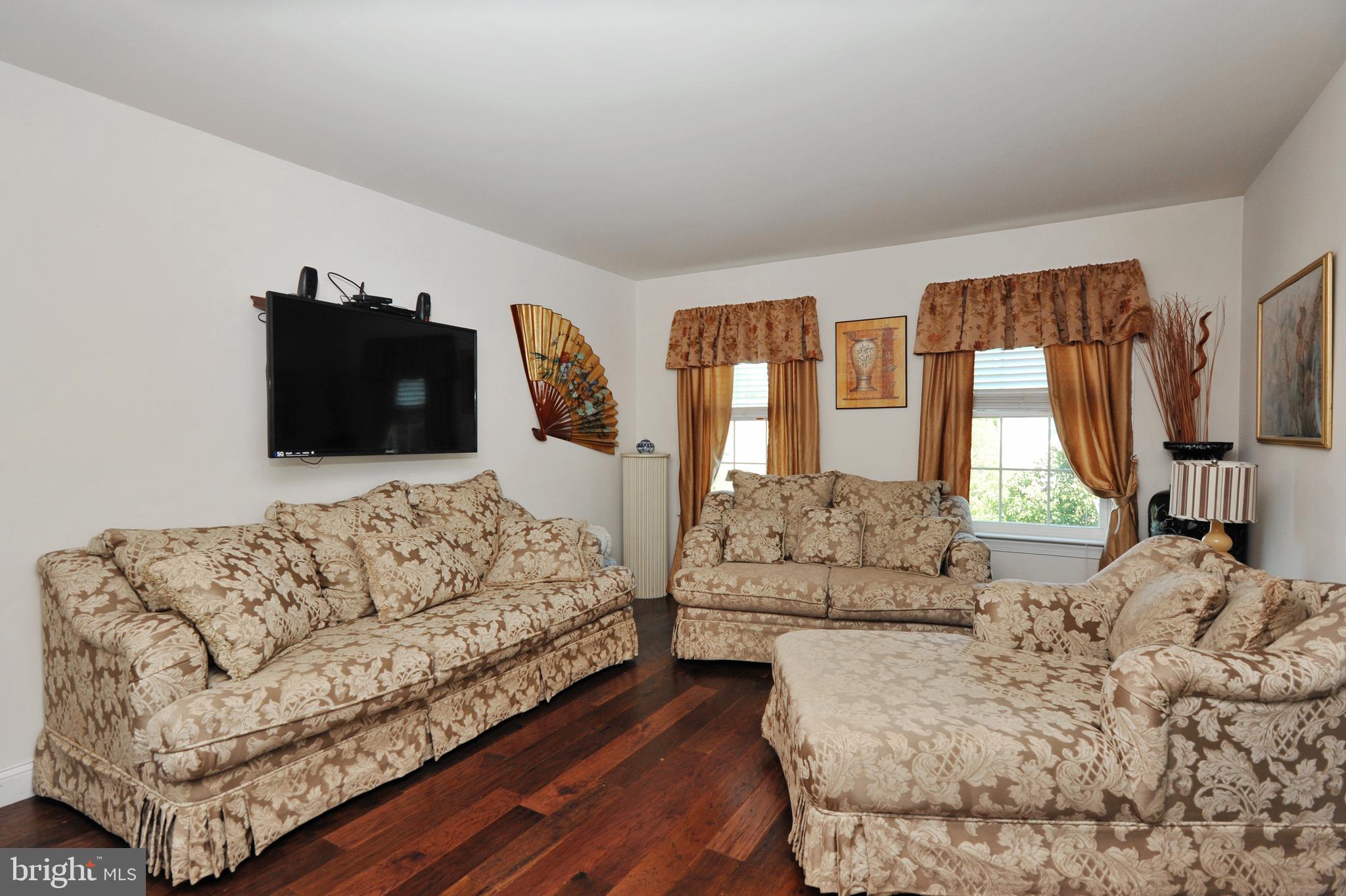 434 Hoffman Road Harleysville, PA 19438 - Photo 34 of 46 a living room with furniture and a large window