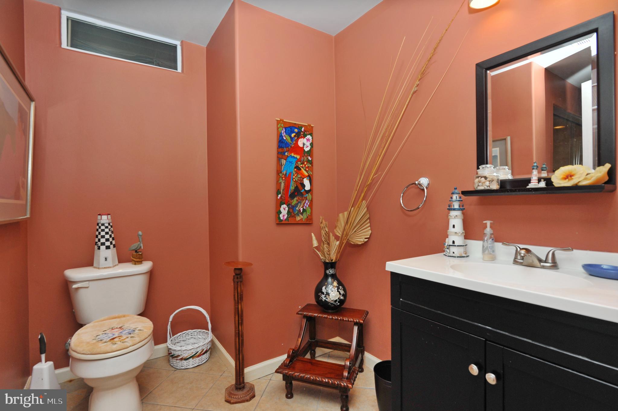 434 Hoffman Road Harleysville, PA 19438 - Photo 44 of 46 a bathroom with a toilet sink and mirror