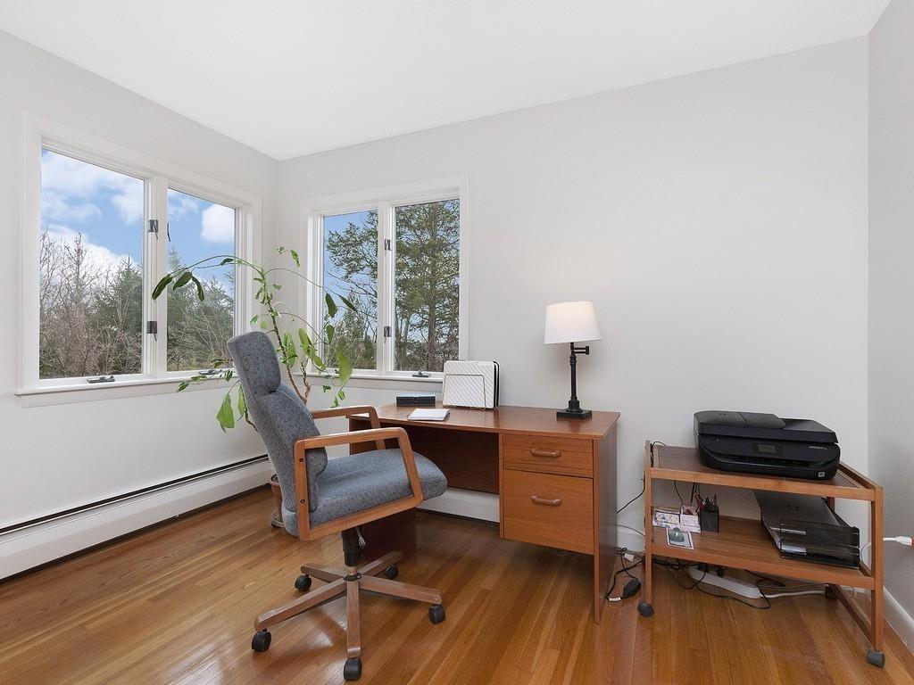 37 Slocum Road Boston, MA 02130 - Photo 15 of 27 a view of a workspace with furniture and a window