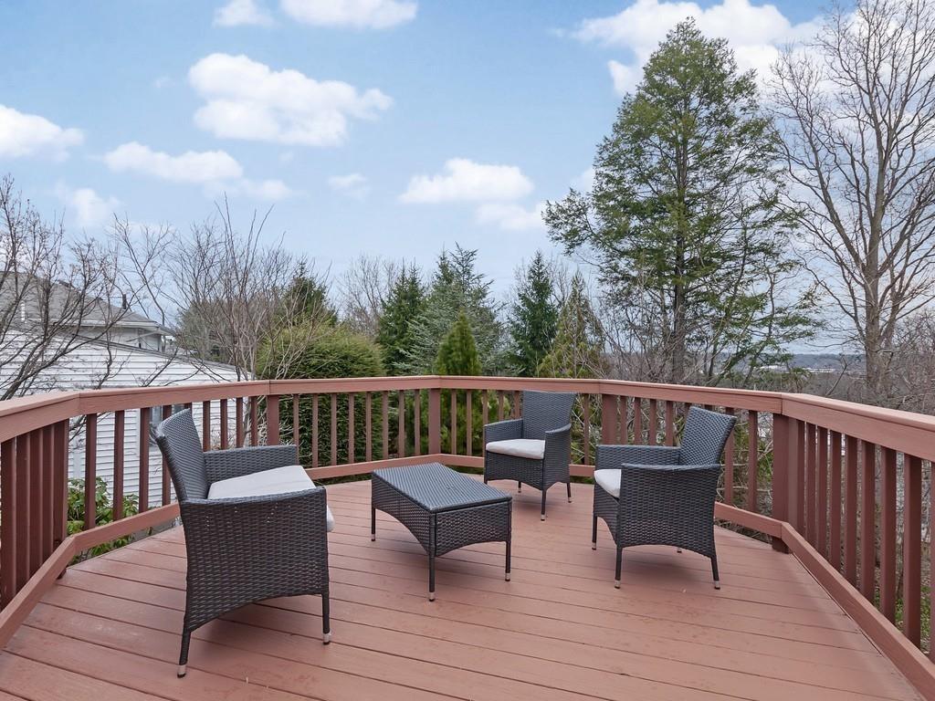 37 Slocum Road Boston, MA 02130 - Photo 22 of 27 a view of sitting area on roof deck with wooden floor and fence