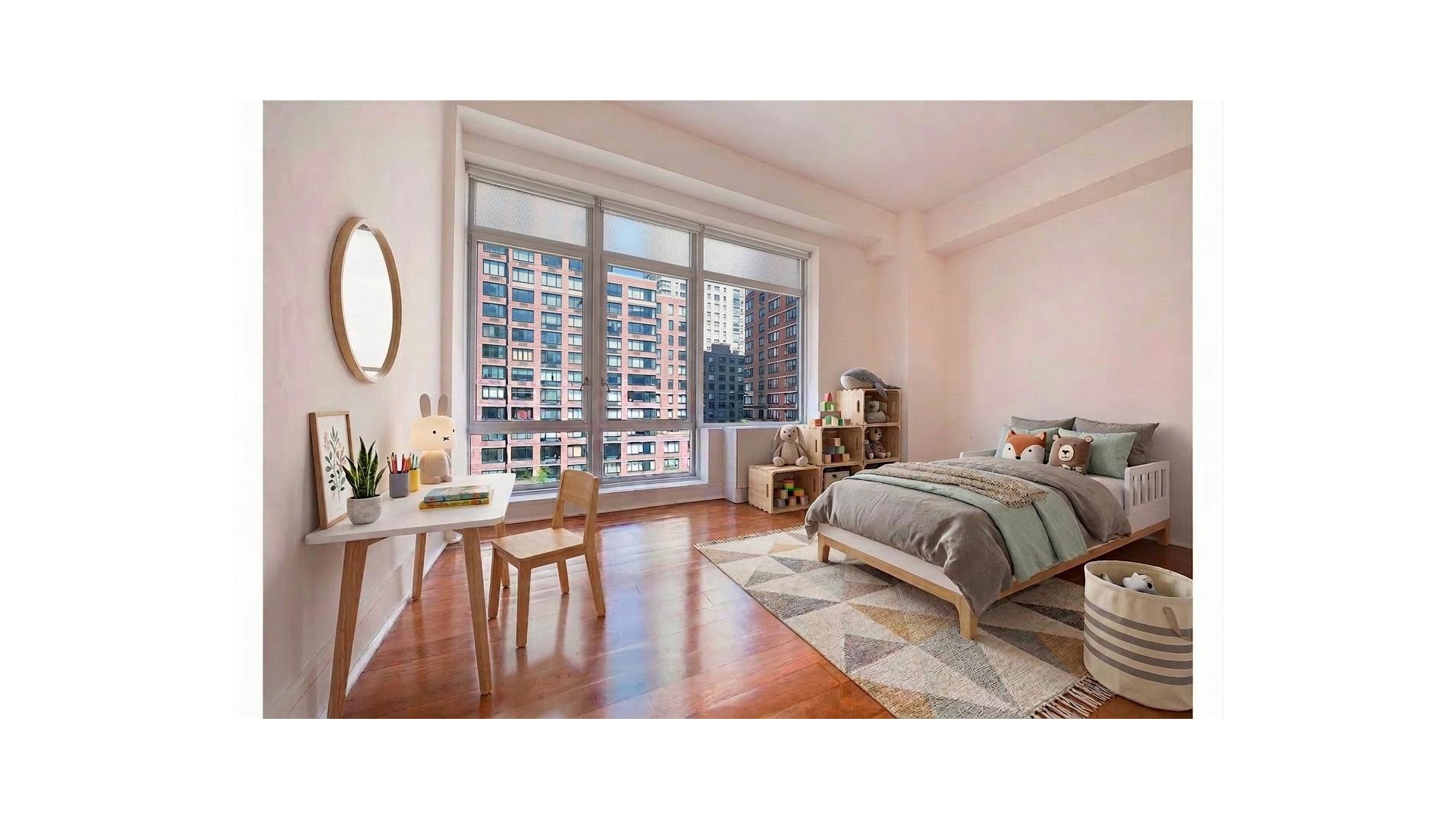 426 West 58th Street, Unit PH2 Manhattan, NY 10019 - Photo 6 of 11 a living room with a bed furniture and a large window