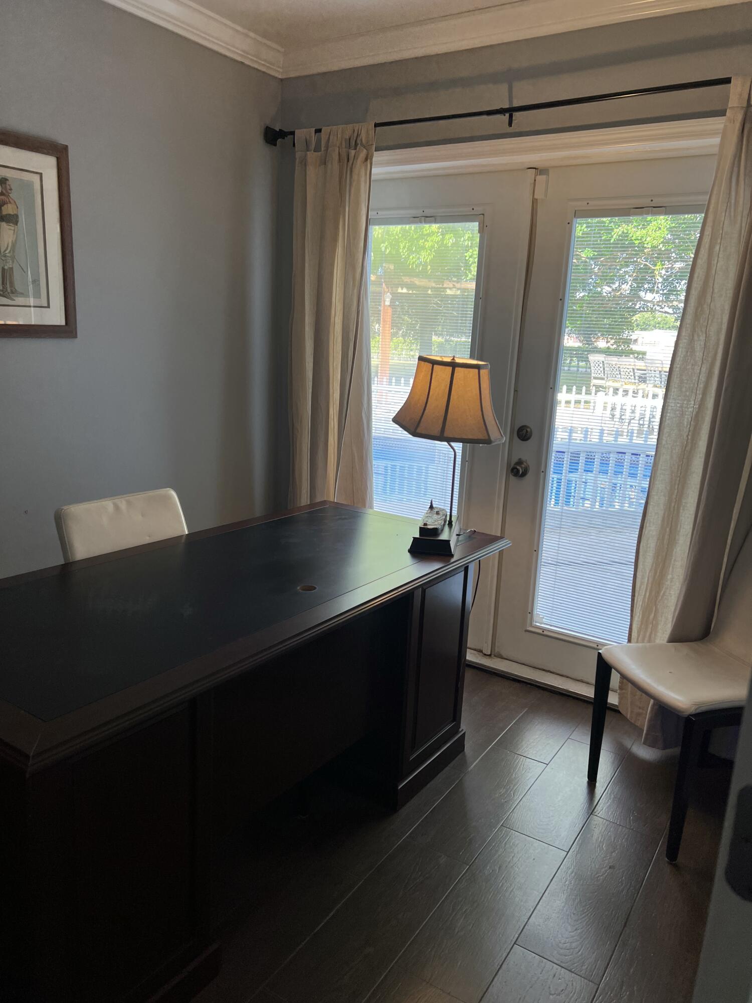 16163 16097 Rustic Road Wellington, FL 33470 - Photo 10 of 36 a living room with furniture and a window