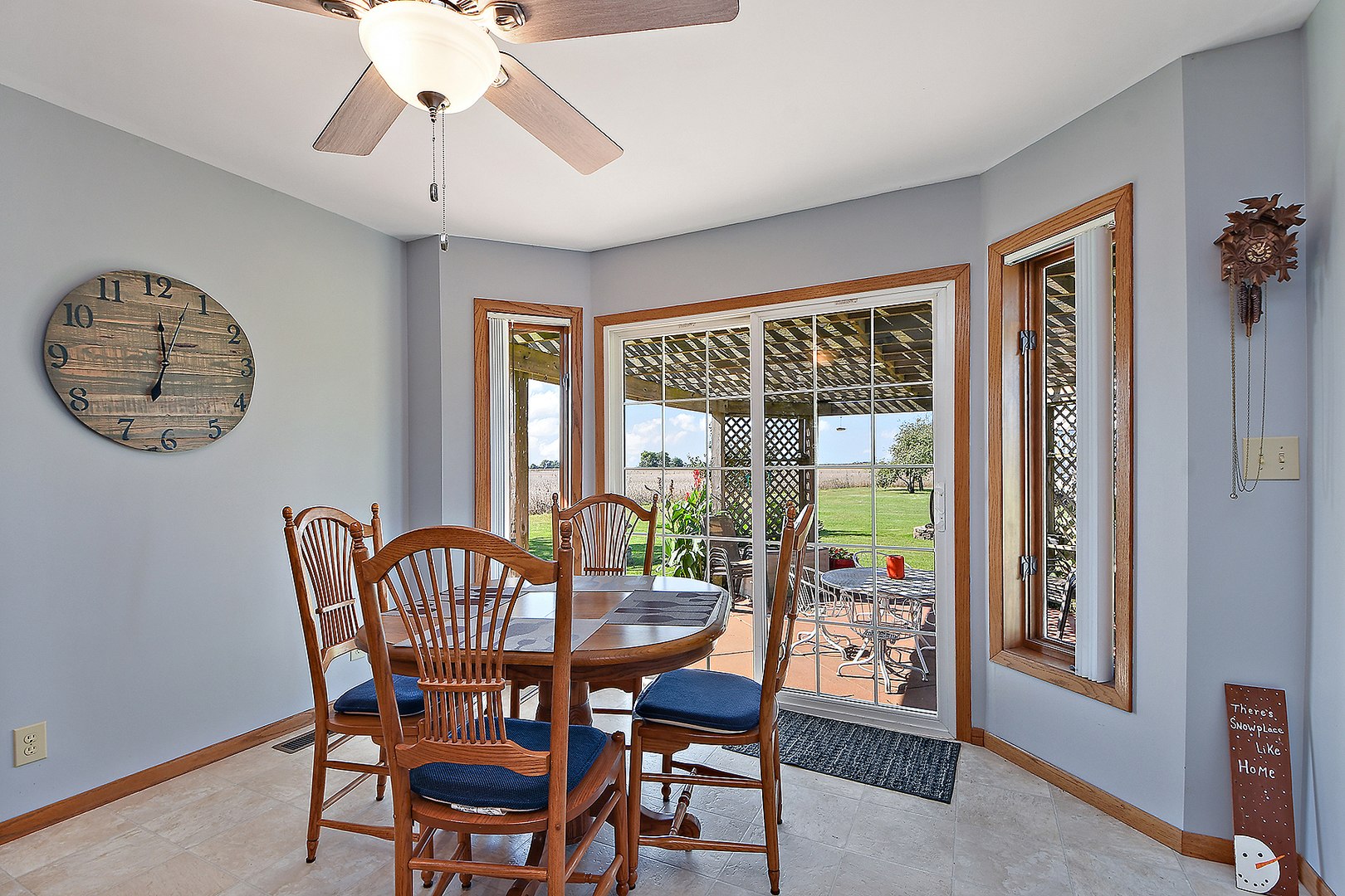 32220 South Cedar Road Manhattan, IL 60442 - Photo 11 of 46 a view of a dining room with furniture window and outside view
