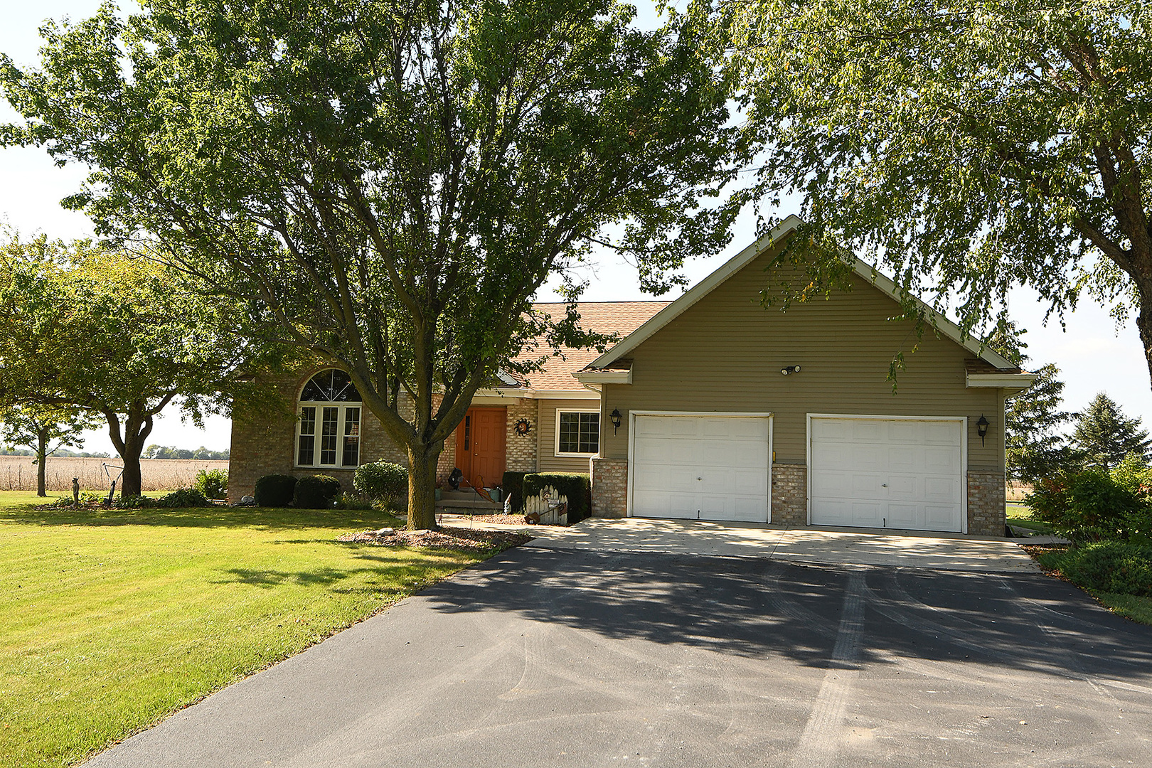 32220 South Cedar Road Manhattan, IL 60442 - Photo 3 of 46 a front view of house with yard and trees around