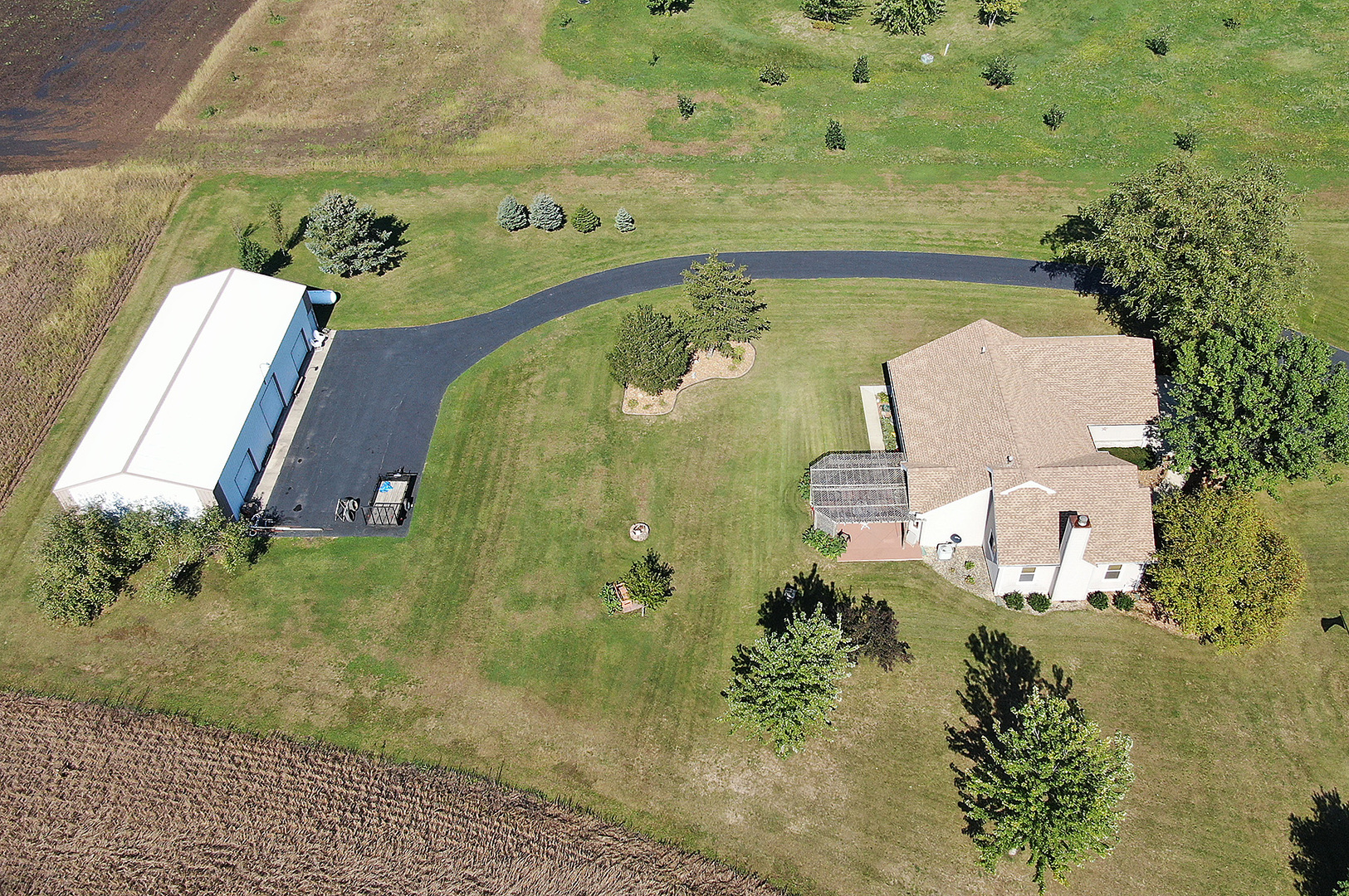 32220 South Cedar Road Manhattan, IL 60442 - Photo 34 of 46 a view of a swimming pool with a yard