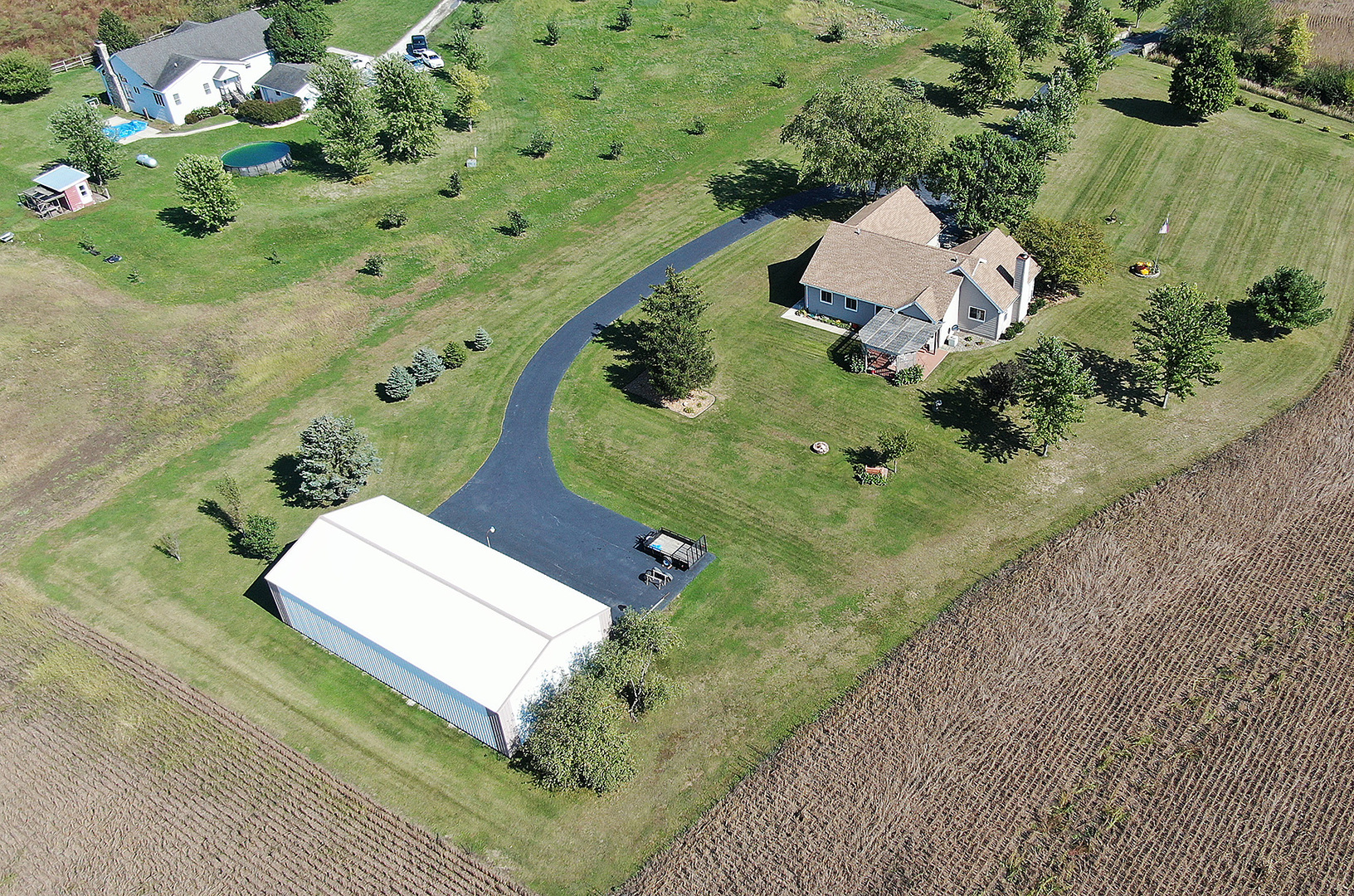 32220 South Cedar Road Manhattan, IL 60442 - Photo 35 of 46 an aerial view of a house with a yard