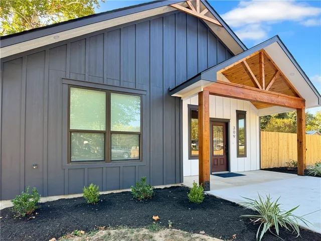 a front view of a house having yard