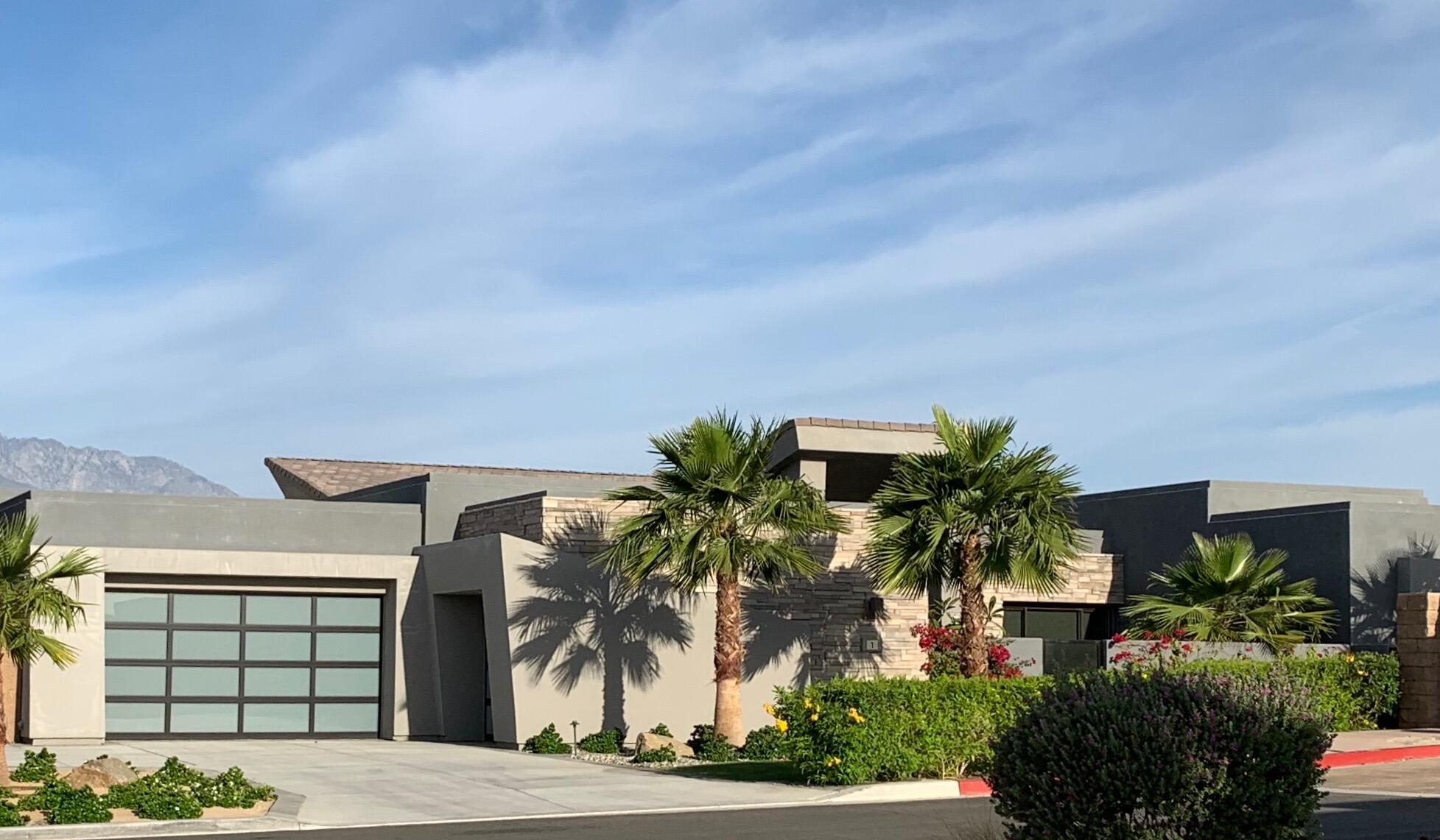 1 Via Merenda Rancho Mirage, CA 92270 - Photo 1 of 29 a palm tree sitting in front of a house