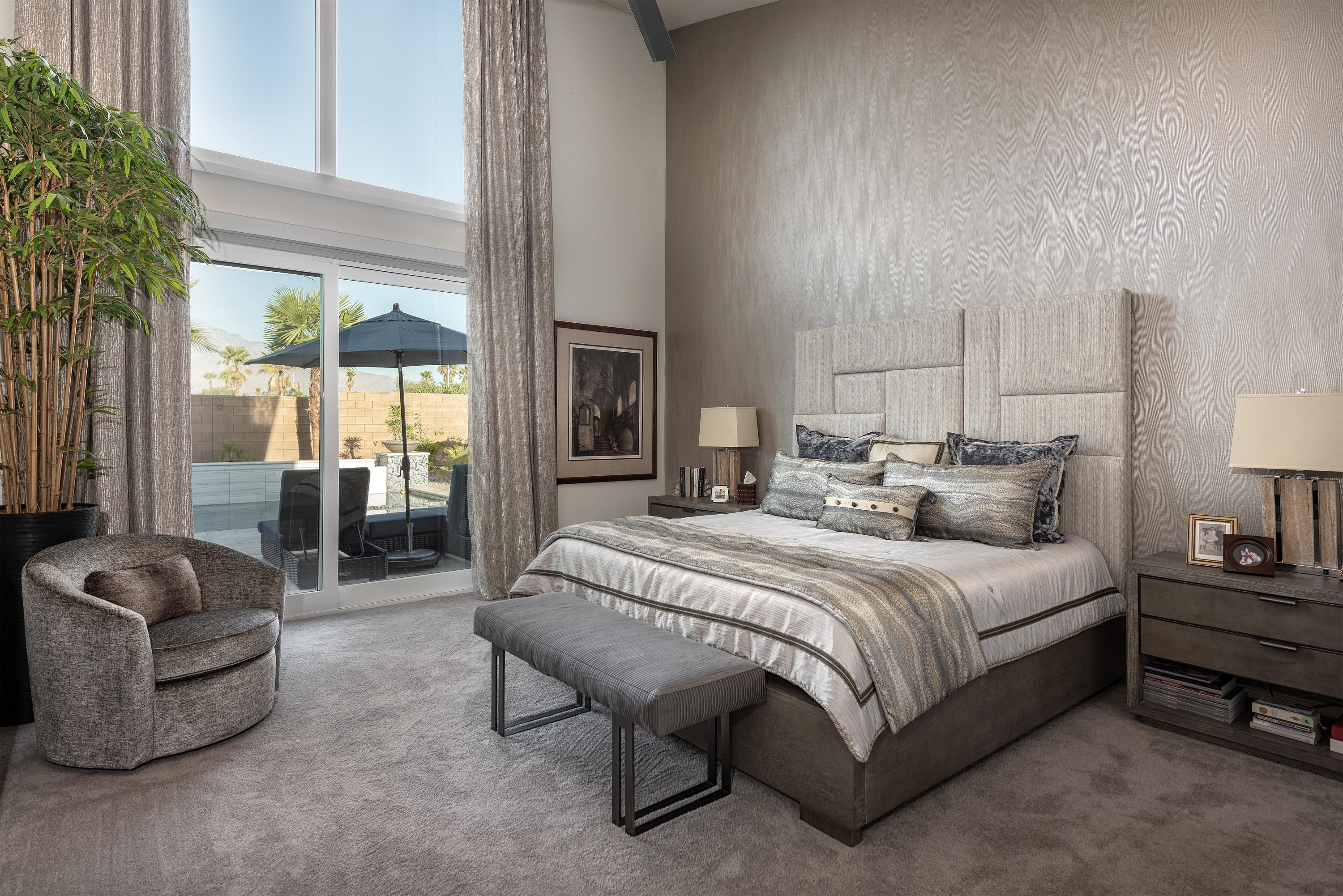 1 Via Merenda Rancho Mirage, CA 92270 - Photo 19 of 29 a spacious bedroom with a bed and large window