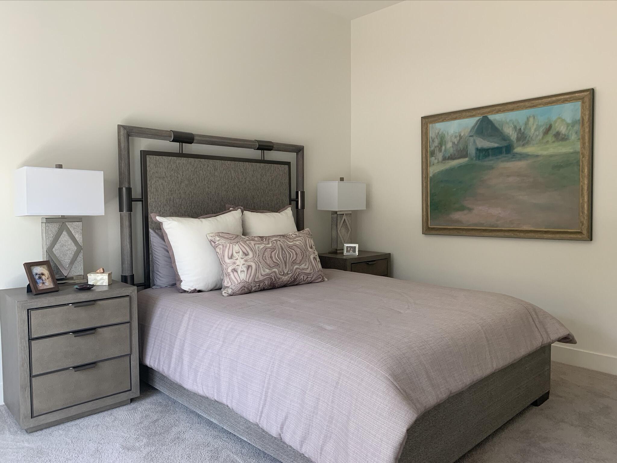 1 Via Merenda Rancho Mirage, CA 92270 - Photo 23 of 29 a bedroom with a bed and a painting on the wall