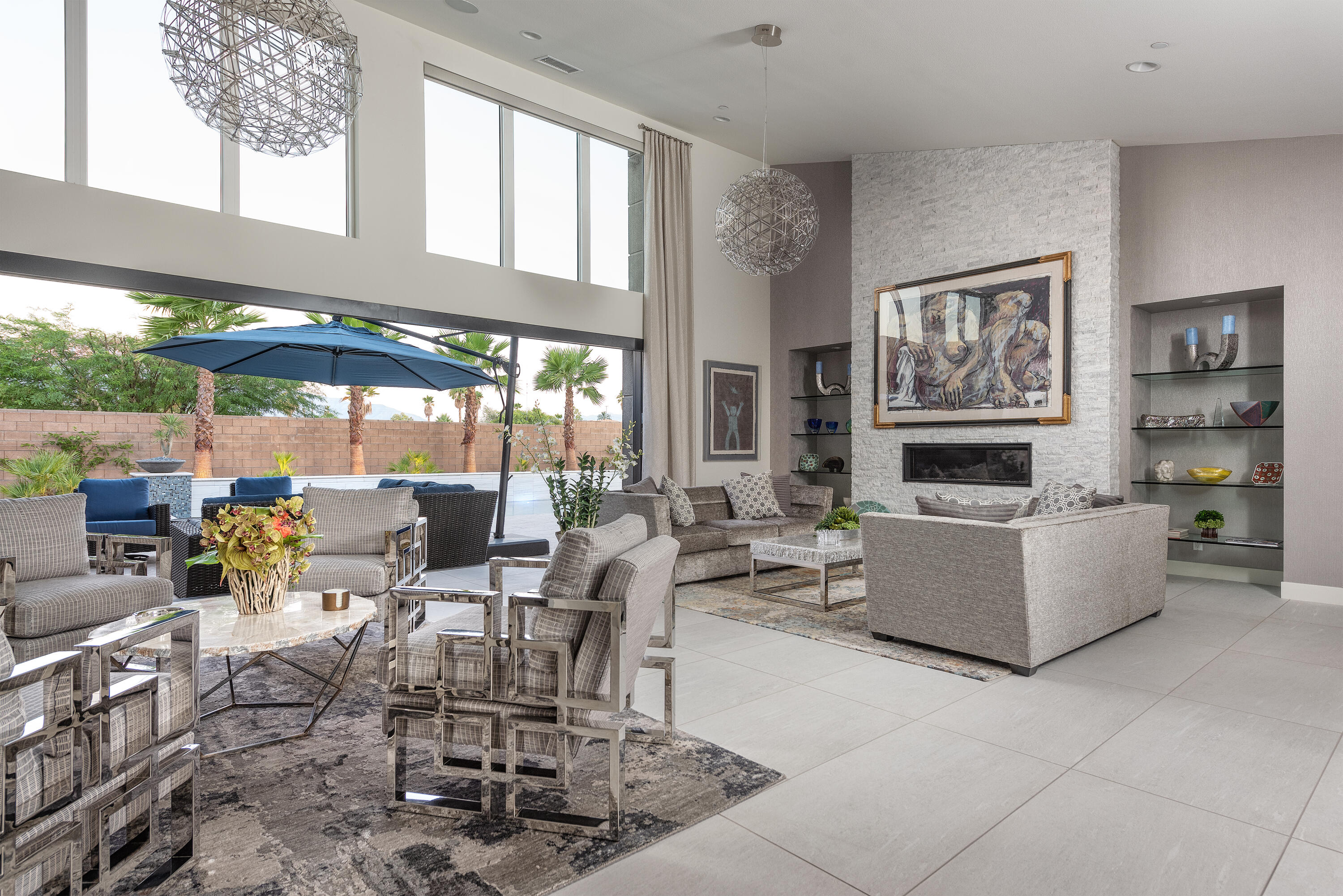 1 Via Merenda Rancho Mirage, CA 92270 - Photo 4 of 29 a living room with fireplace furniture and a large window