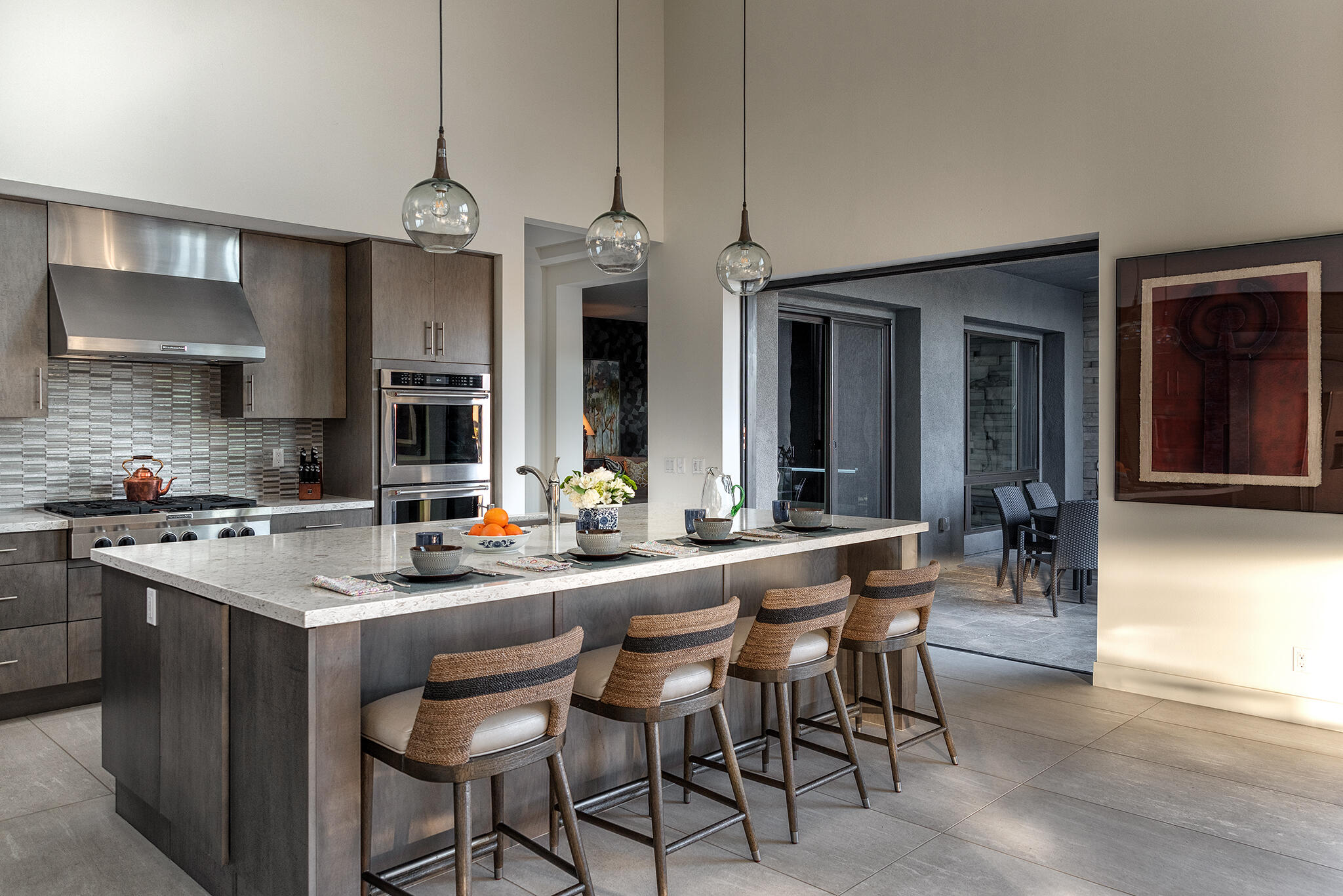 1 Via Merenda Rancho Mirage, CA 92270 - Photo 7 of 29 a kitchen with a dining table and chairs
