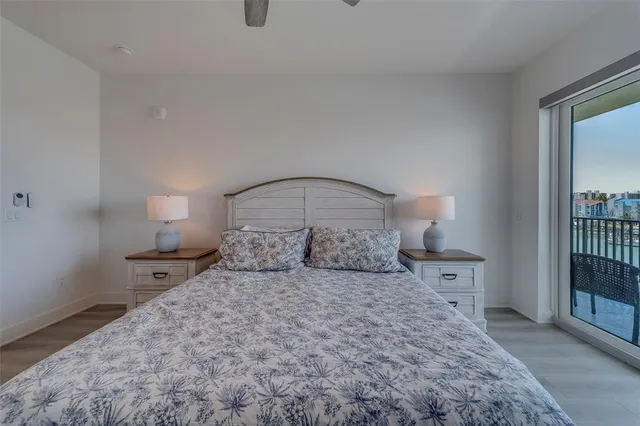 a bathroom with a granite countertop toilet and a shower