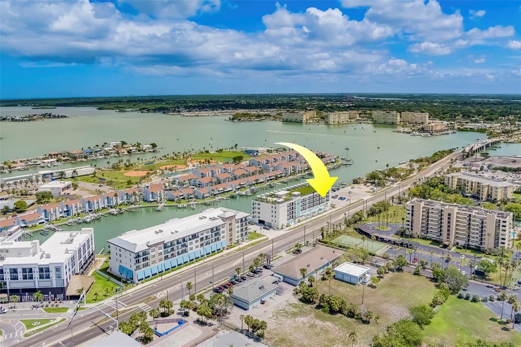 400 150th Avenue, Unit 301 Madeira Beach, FL 33708 - Photo 63 of 66 a view of a city and a lake view