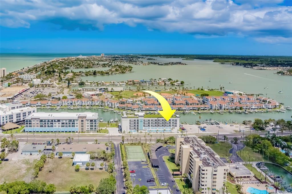 400 150th Avenue, Unit 301 Madeira Beach, FL 33708 - Photo 64 of 66 a view of a city with an ocean view