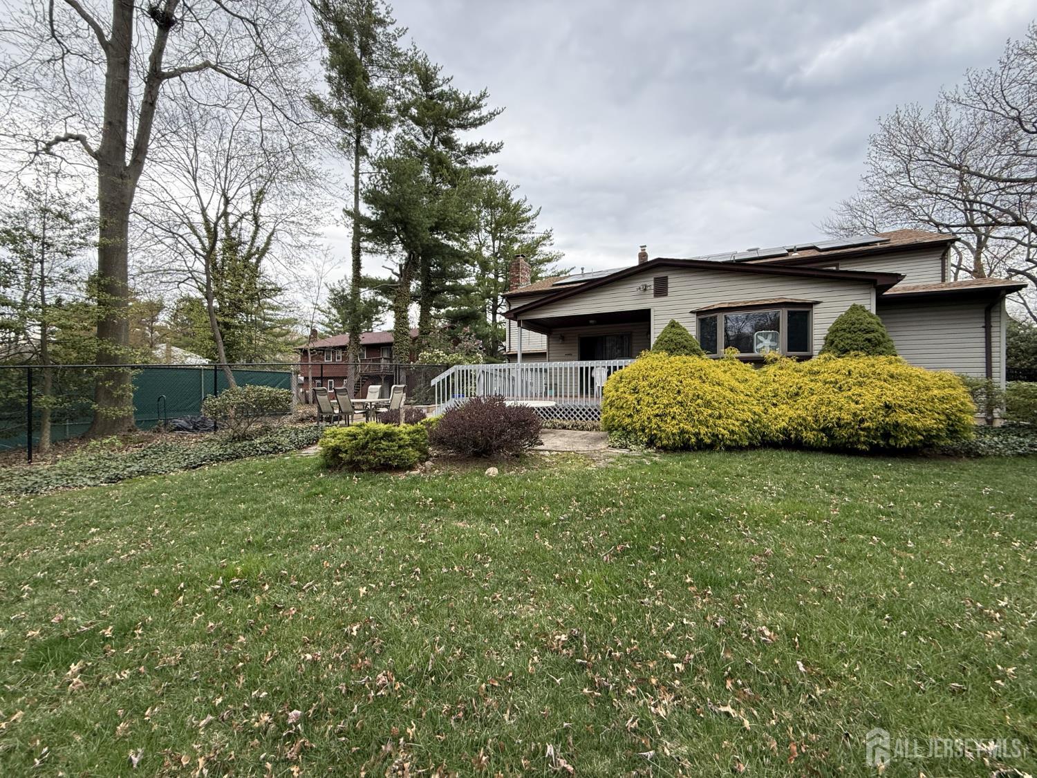 15 Cutter Avenue Edison, NJ 08820 - Photo 20 of 32 a front view of a house with garden