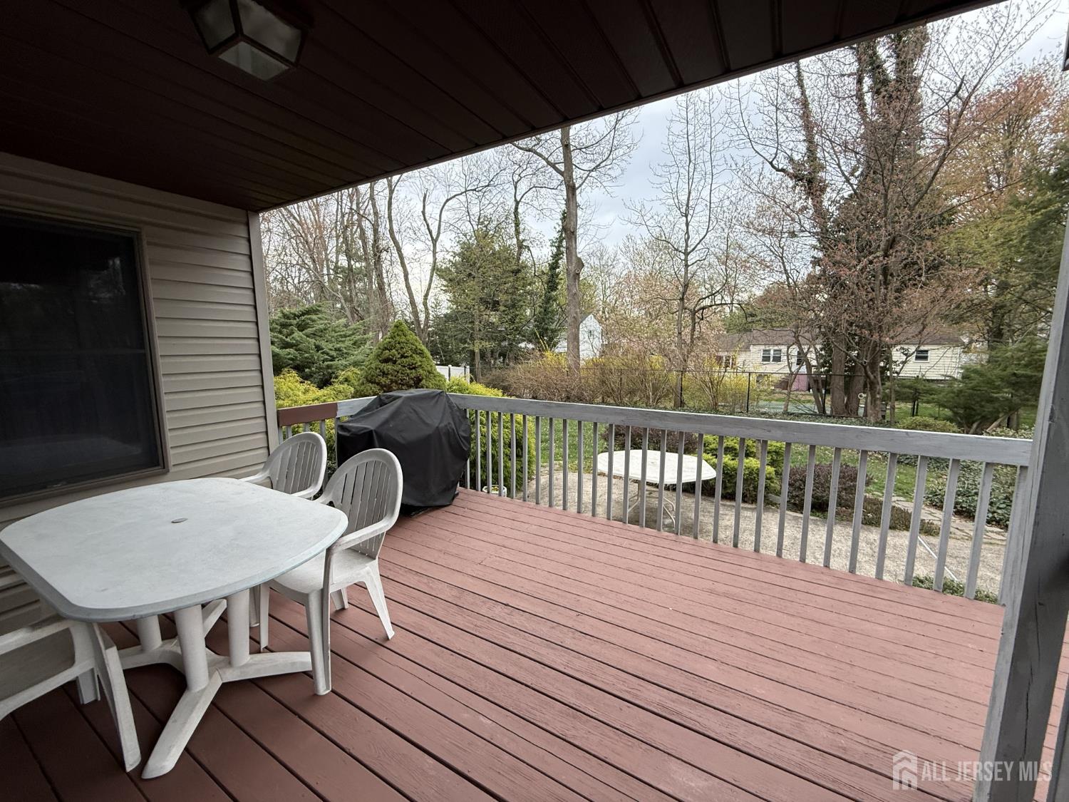 15 Cutter Avenue Edison, NJ 08820 - Photo 22 of 32 a view of a balcony with table and chairs