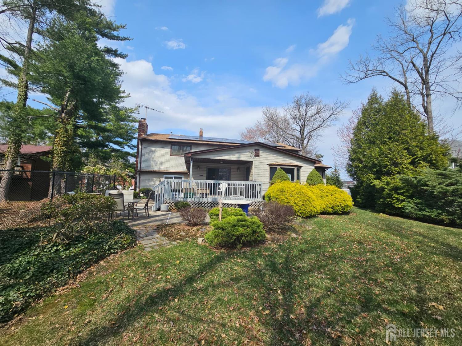 15 Cutter Avenue Edison, NJ 08820 - Photo 24 of 32 a view of a house with backyard and sitting area