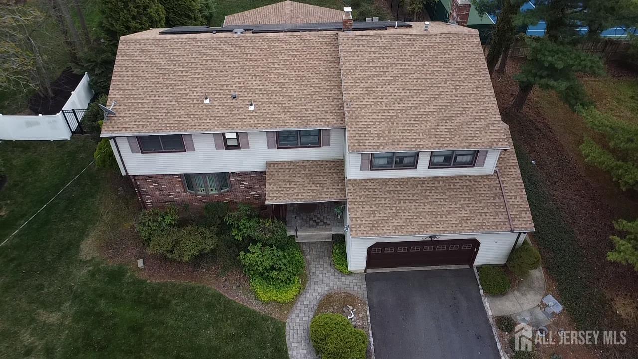 15 Cutter Avenue Edison, NJ 08820 - Photo 29 of 32 an aerial view of a house with a yard