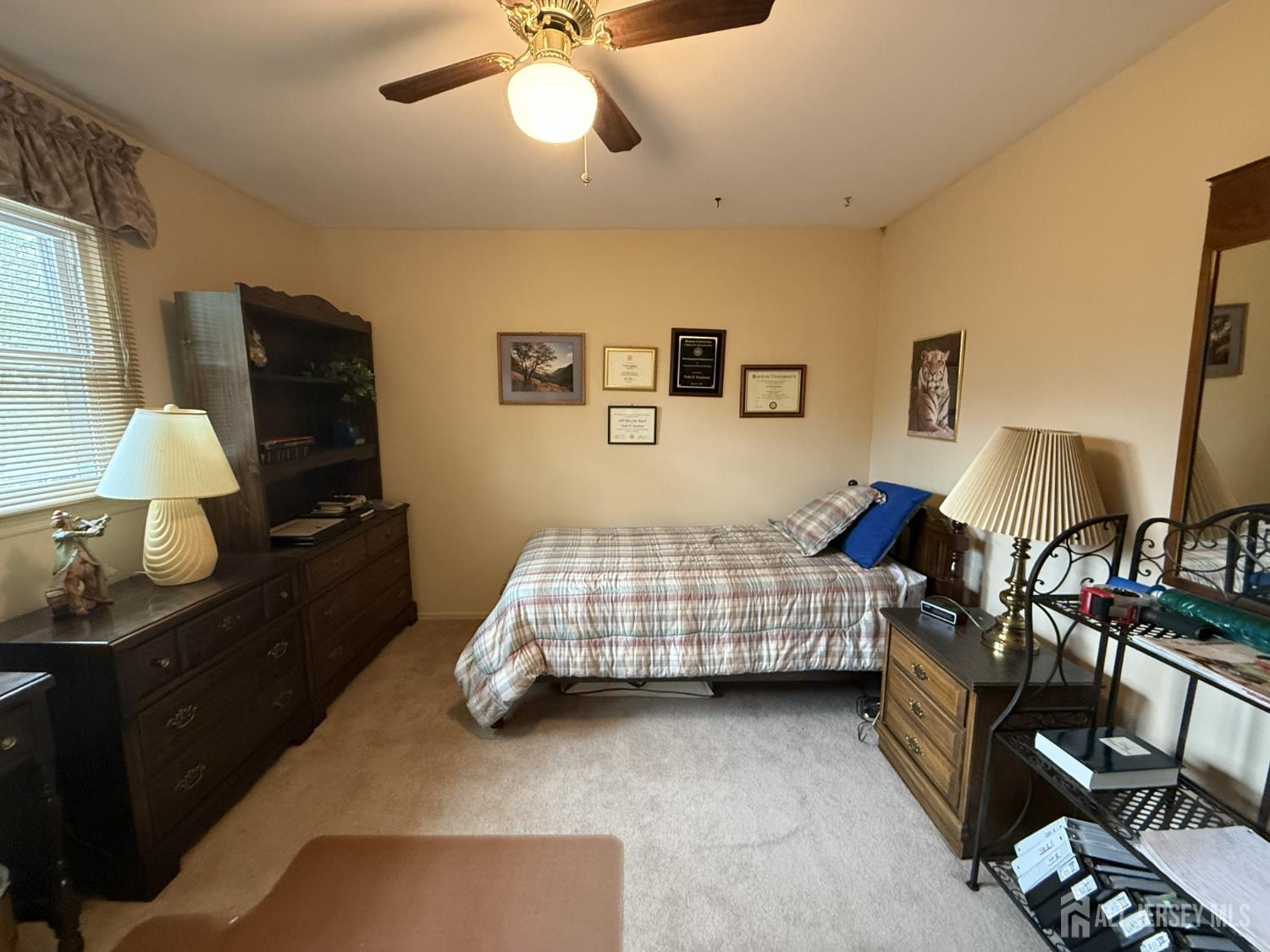15 Cutter Avenue Edison, NJ 08820 - Photo 3 of 32 a bedroom with a bed and a tv