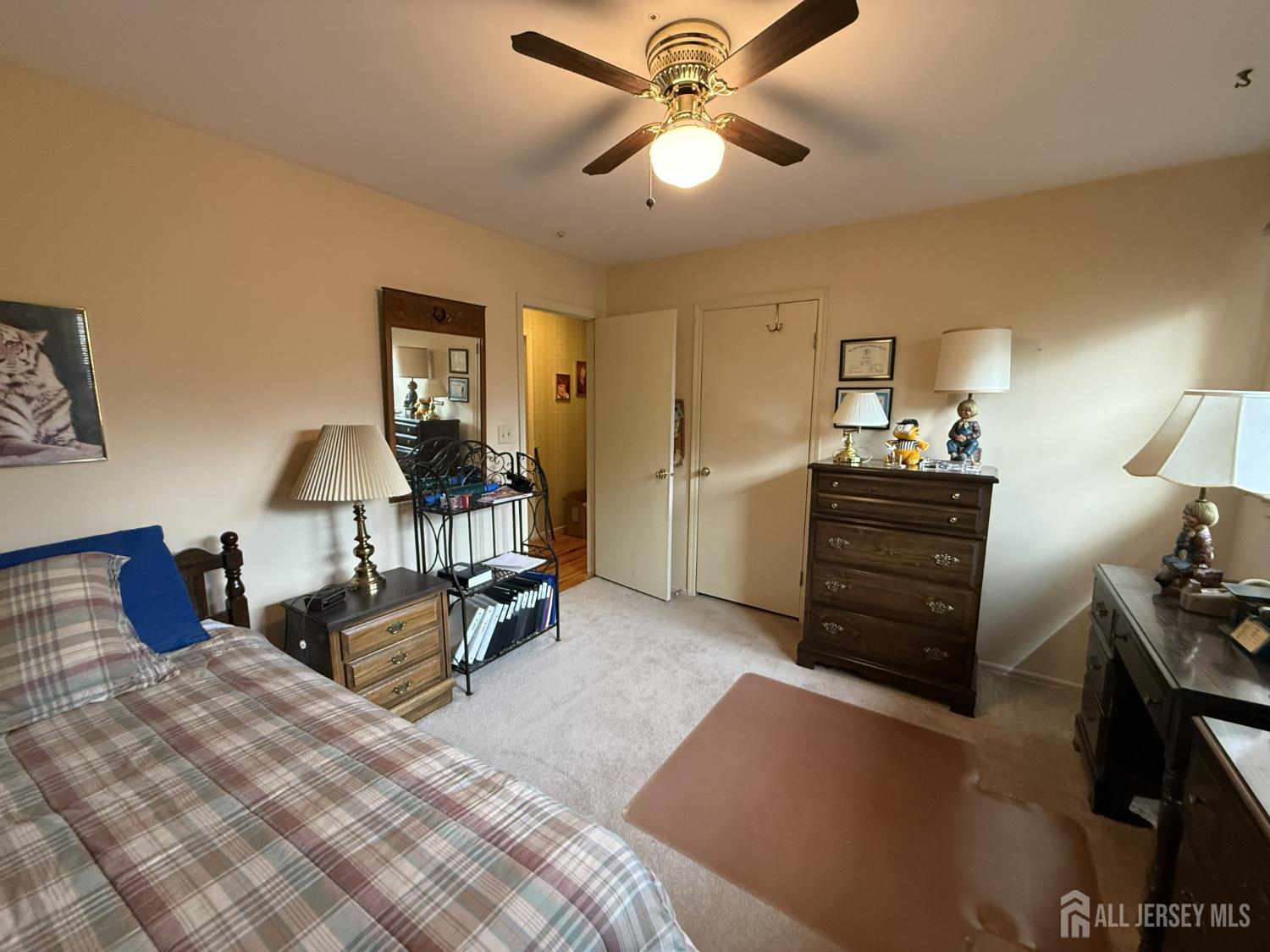 15 Cutter Avenue Edison, NJ 08820 - Photo 4 of 32 a bedroom with furniture and a bed