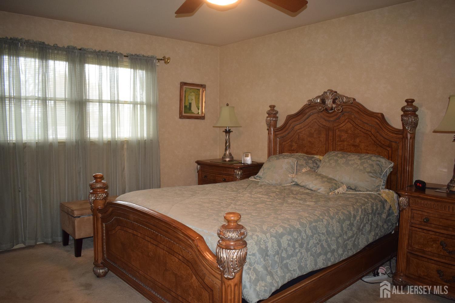 15 Cutter Avenue Edison, NJ 08820 - Photo 6 of 32 a bedroom with a bed and window