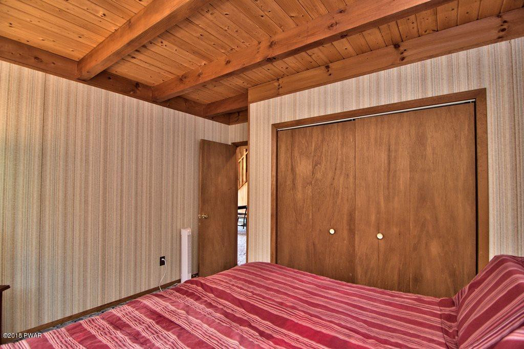 2327 Brookfield Road Lake Ariel, PA 18436 - Photo 15 of 53 a view of a room with a wooden door