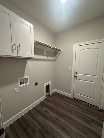 a view of small space with wooden floor