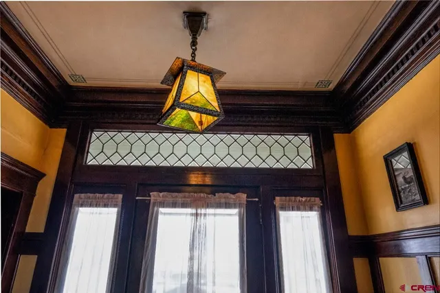 a bed room with a bed and a window