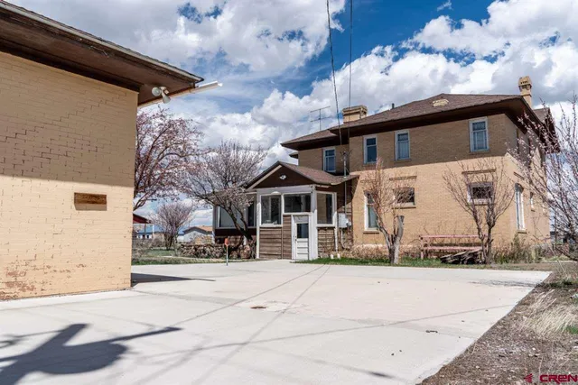 a front view of a house with a pathway