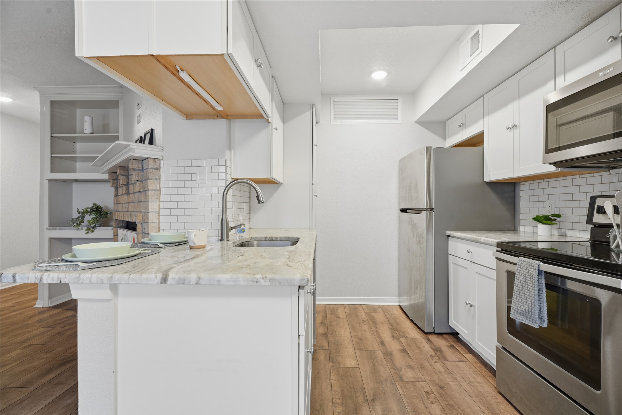 Cabinets and all appliances are all like new.
