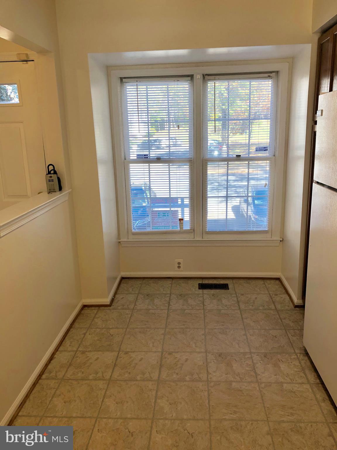 8568 Springfield Oaks Drive Springfield, VA 22153 - Photo 2 of 38 Light filled eat in kitchen with new flooring