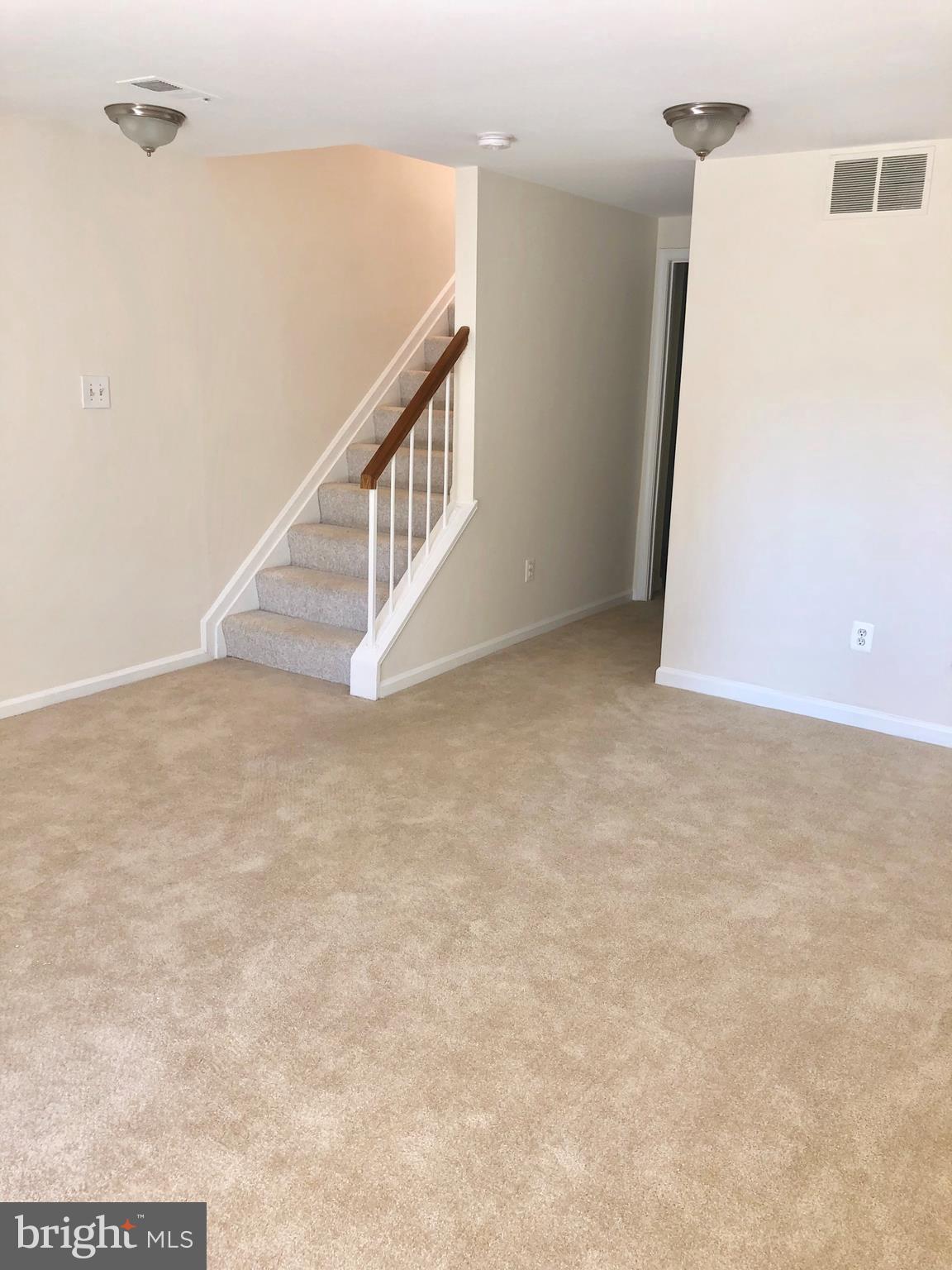 8568 Springfield Oaks Drive Springfield, VA 22153 - Photo 22 of 38 Lower Level Carpeted Family Room
