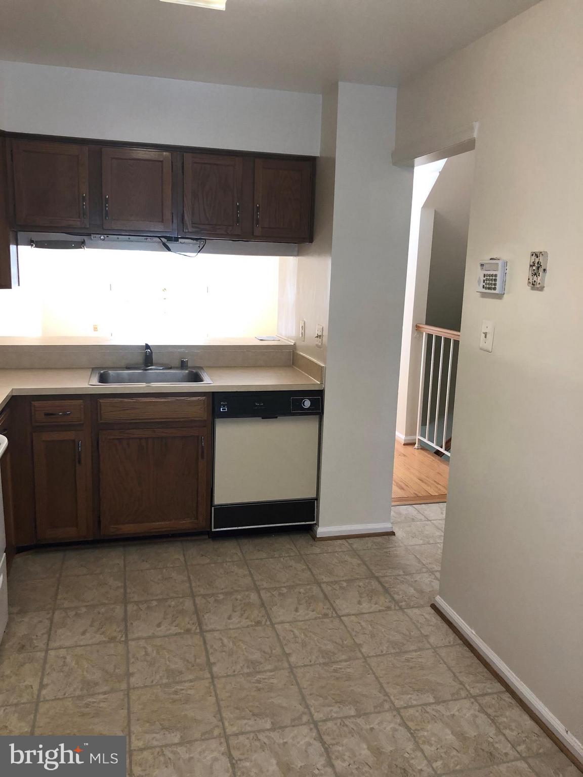 8568 Springfield Oaks Drive Springfield, VA 22153 - Photo 4 of 38 Kitchen with new flooring