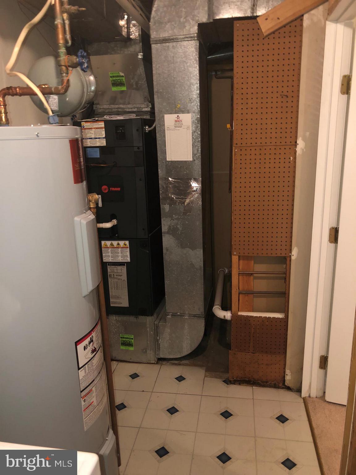 8568 Springfield Oaks Drive Springfield, VA 22153 - Photo 32 of 38 Storage in Laundry Room - HVAC 2016
