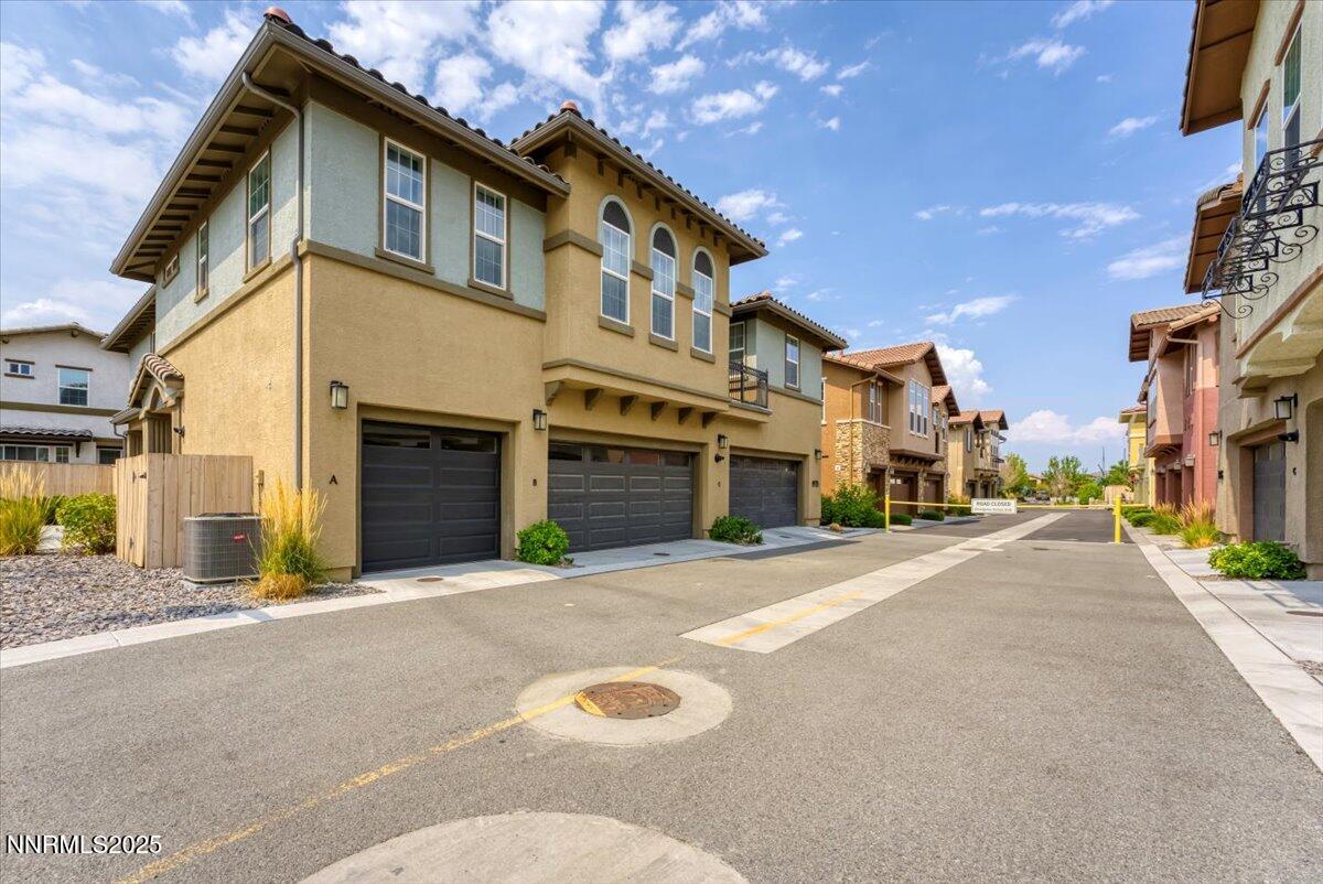 1932 Wind Ranch Road, Unit C Reno, NV 89521 - Photo 1 of 29 a view of a street with buildings