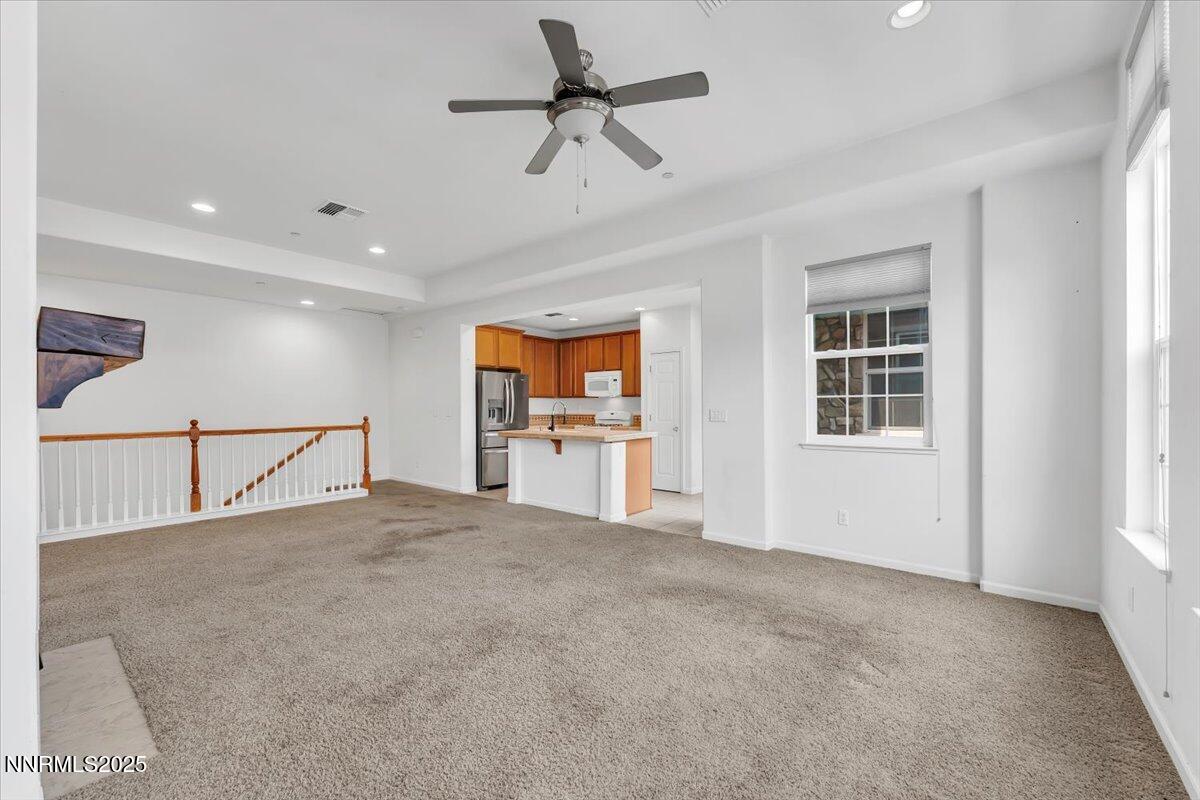 1932 Wind Ranch Road, Unit C Reno, NV 89521 - Photo 15 of 29 a view of an empty room with a window