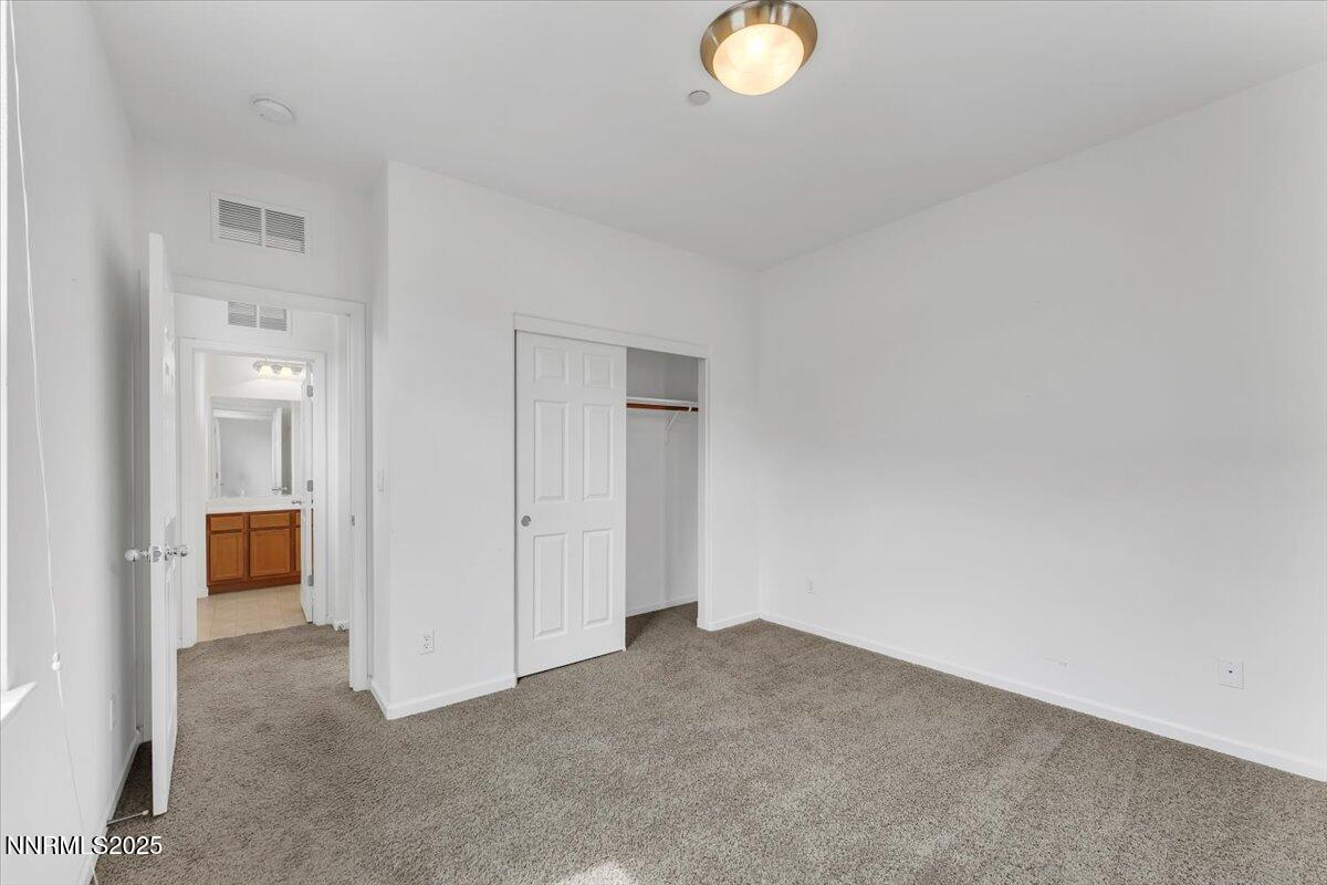 1932 Wind Ranch Road, Unit C Reno, NV 89521 - Photo 26 of 29 a view of an empty room and a sink