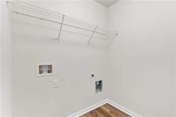 a view of a small space with racks on the wall