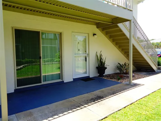a view of front door and porch