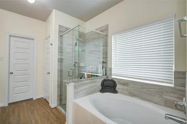 a bathroom with a sink and a bathtub