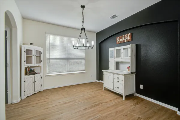 a room with furniture and window